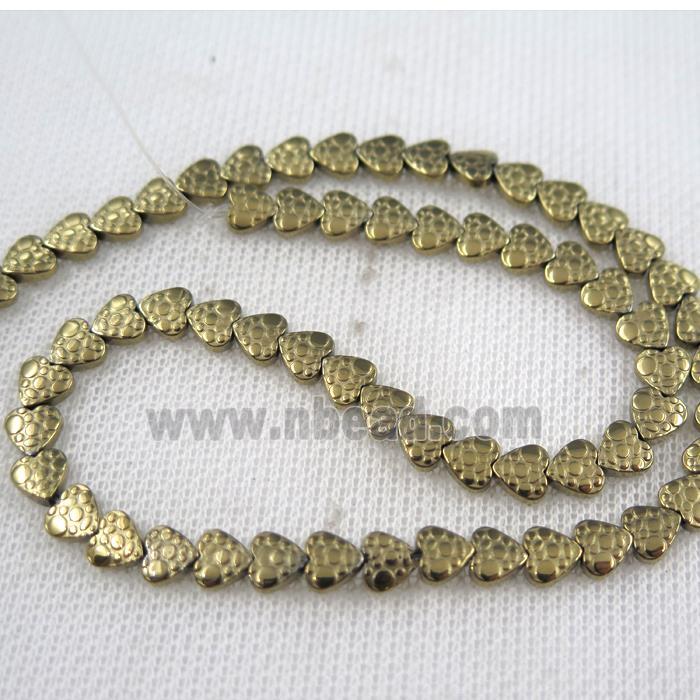 Hematite beads, heart, lt.gold