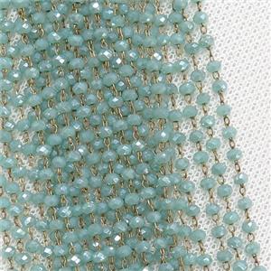 raw brass chain with blue crystal glass, approx 2x3mm