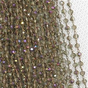 raw brass chain with smoky rainbow crystal glass, approx 2x3mm