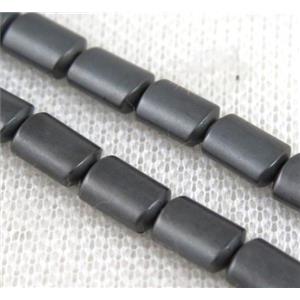 matte hematite beads, flat barrel, black, approx 6x9mm