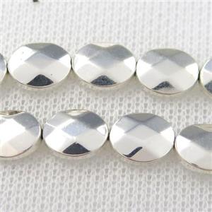 Hematite beads, faceted oval, silver plated, approx 8x10mm