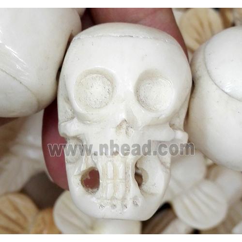 white antique cattle bone beads, skull