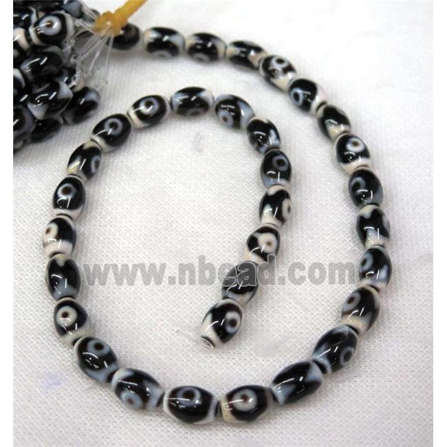 black Tibetan Agate barrel beads with evil eye