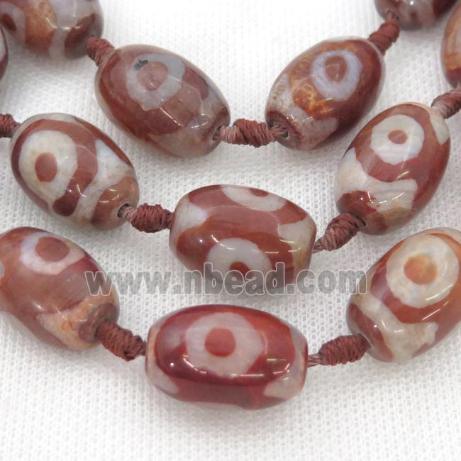 red Tibetan Agate barrel beads, eye