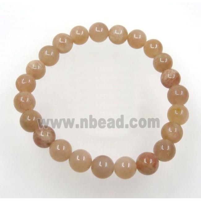 orange SunStone bead bracelet, round, stretchy