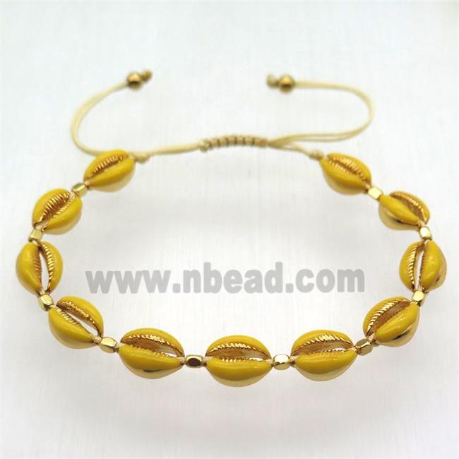 handmade bracelet with coper conch beads, yellow