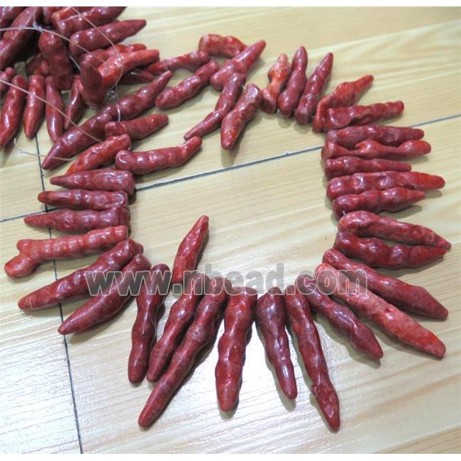 red coral beads, stick, freeform