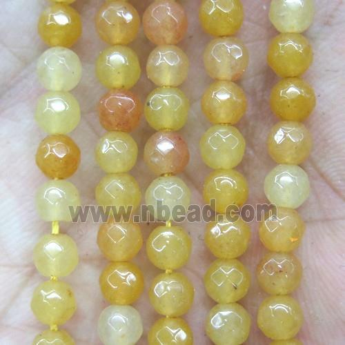 tiny orange jade beads, faceted round