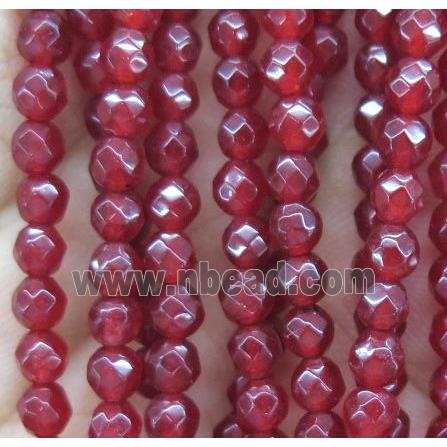 tiny red jade bead, faceted round