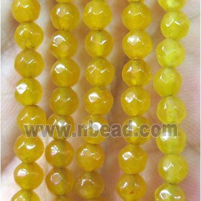 Tiny golden agate bead, faceted round