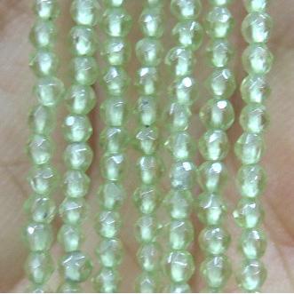tiny peridot beads, faceted round