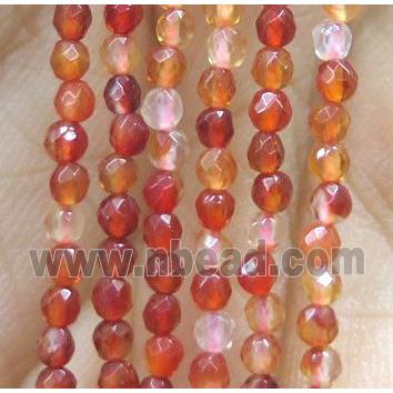tiny red carnelian agate bead, faceted round