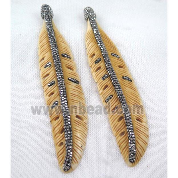 bone feather pendant paved rhinestone, yellow