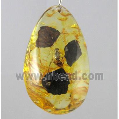 amber pendant, mixed shape, yellow