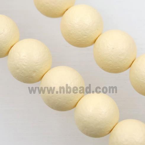 round matte yellow pearlized shell beads