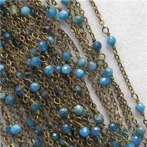 raw brass chain with blue Apatite, approx 3mm dia