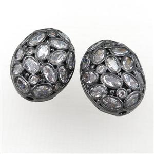 copper oval hollow beads pave zircon, black plated, approx 17-22mm