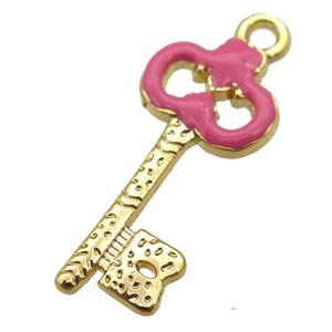 copper Key pendant with hotpink enamel, gold plated, approx 11-24mm