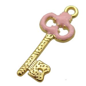 copper Key pendant with pink enamel, gold plated, approx 11-24mm