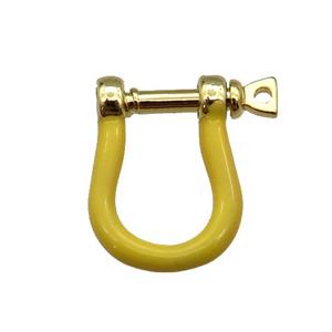 copper U-clasp with yellow enamel, gold plated, approx 15-19mm