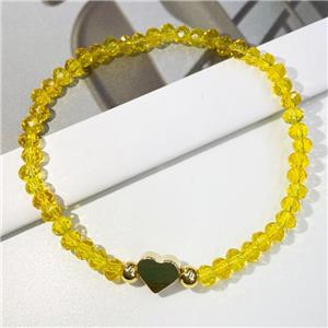 yellow Chinese Crystal Glass Bracelet with gold heart, stretchy, approx 4mm, 22cm length