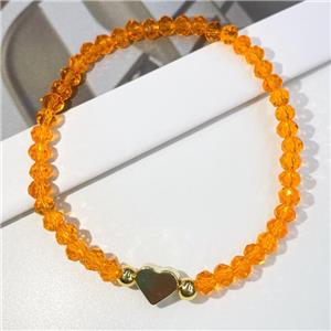 Chinese Crystal Glass Bracelet with gold heart, stretchy, orange, approx 4mm, 22cm length