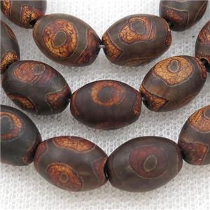 Tibetan Agate rice beads, eye, approx 10-14mm, 24pcs per st