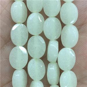 green Glowstone beads, faceted oval, approx 8x10mm