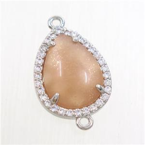 peach MoonStone teardrop connector pave zircon, platinum plated, approx 13-17mm