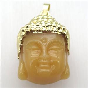 yellow glass Buddha pendant, gold plated, approx 25-35mm