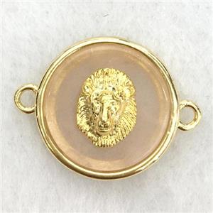 peach sunstone circle connector with lionhead, approx 15mm dia
