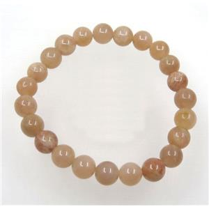 orange SunStone bead bracelet, round, stretchy, approx 8mm, 60mm dia