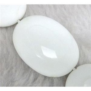 porcelain beads, flat oval, faceted, approx 15x20mm, 15.5 inches