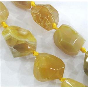 agate bead, faceted freeform, yellow, approx 10-20mm, 15.5 inches