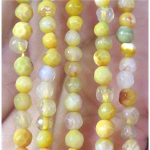 Tiny yellow agate bead, faceted round, approx 4mm dia