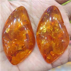 Amber pendant, freeform, orange, NR, approx 35-58mm