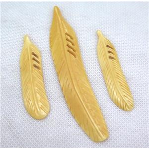 yellow bone feather pendant, approx 15-75mm