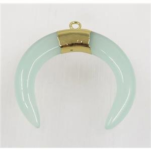 lt.green crystal glass crescent pendant, gold plated, approx 30-35mm
