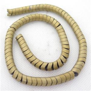 Hematite wave Beads, snakeskin, matte, gold plated, approx 8mm