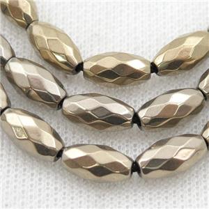 Hematite beads, faceted rice, pyrite color electroplated, approx 6-12mm