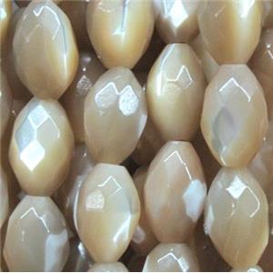 mother of pearl bead, faceted oval, approx 7x10mm