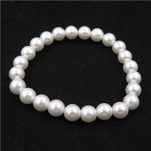 white pearlized shell bracelet, approx 8mm dia
