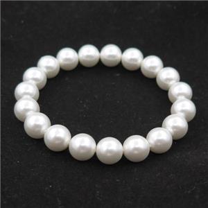 white pearlized shell bracelet, approx 10mm dia
