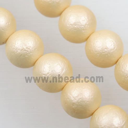 round matte yellow pearlized shell beads