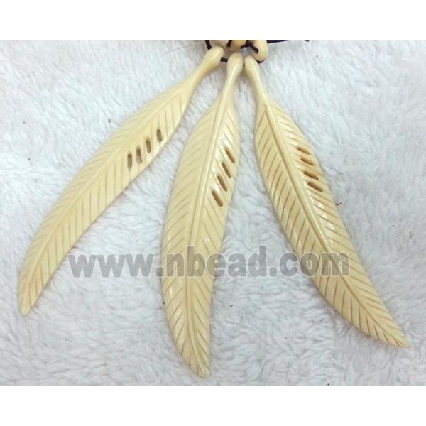 yellow cattle bone pendant, feather