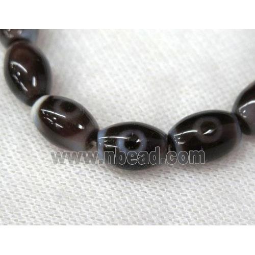 black Tibetan Agate barrel beads with evil eye