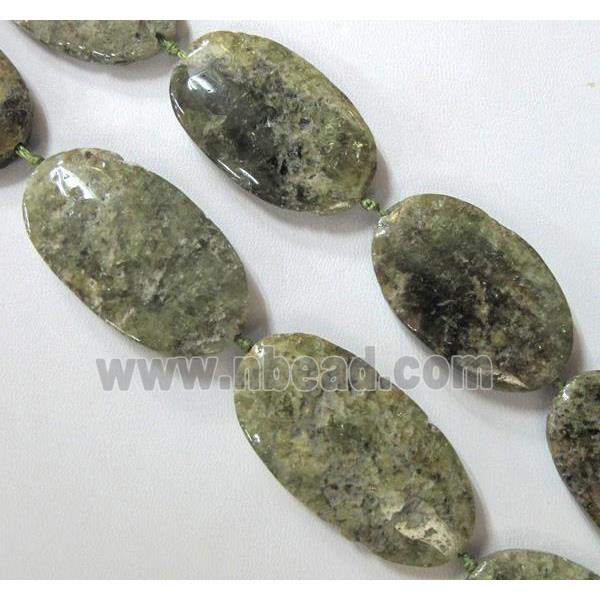 green garnet bead, flat-oval