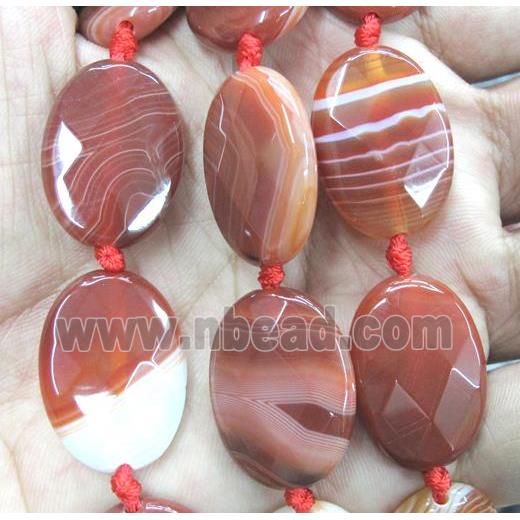 red striped agate bead, faceted oval