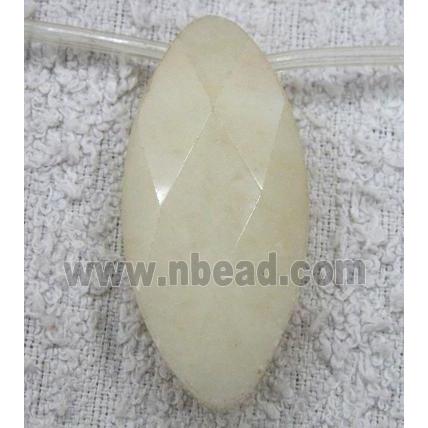 yellow jade bead, faceted flat-oval