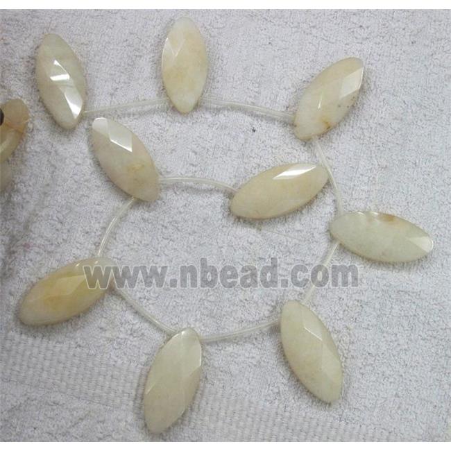 yellow jade bead, faceted flat-oval
